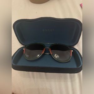 Authentic Red and green Gucci aviator sunglasses.